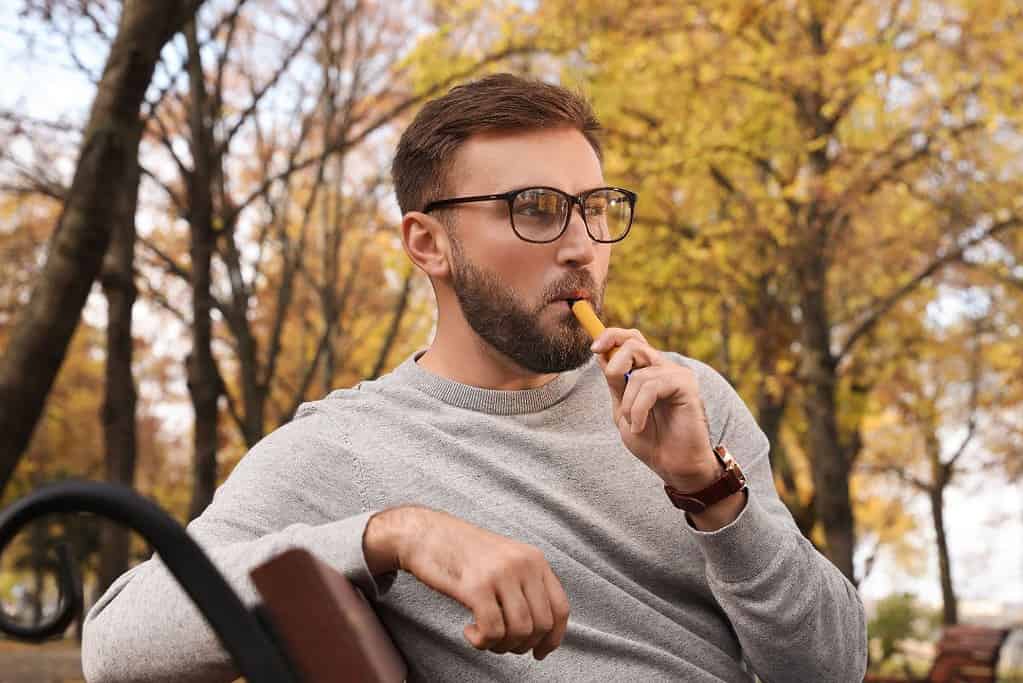 A guy using a high quality disposable vape