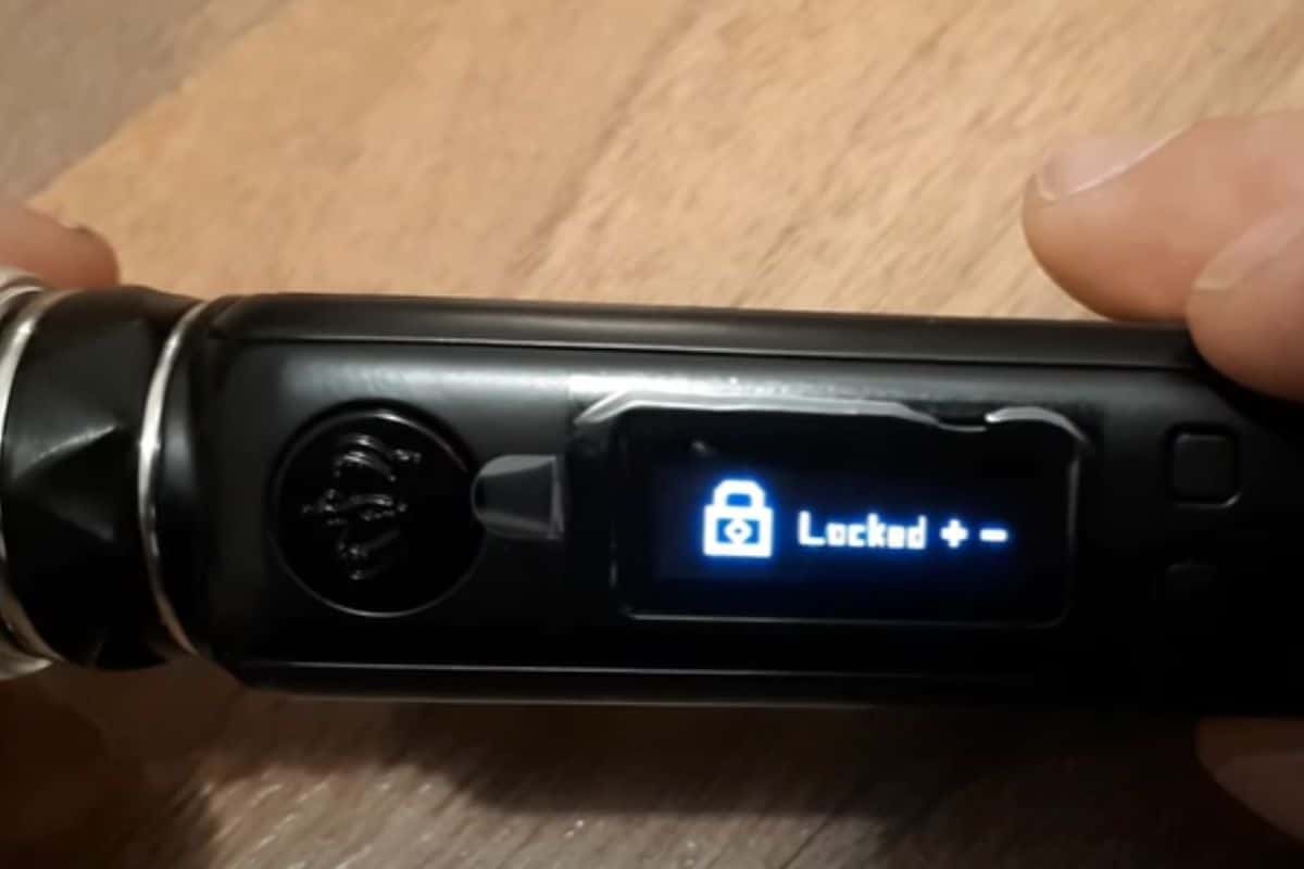 A vape device showing locked on the screen
