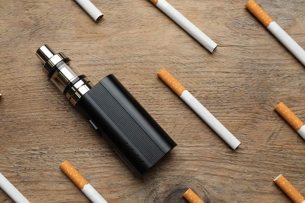 Cigarettes and a vape mod