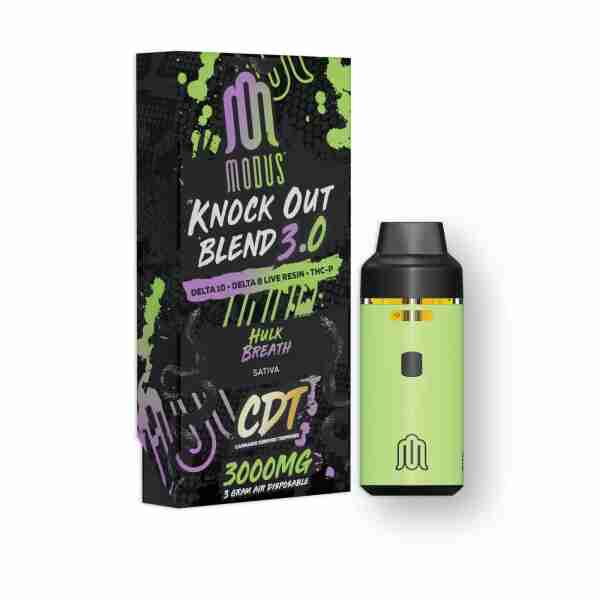 A green box with the Modus Knockout Blend Disposables (3.0g) e-liquid.