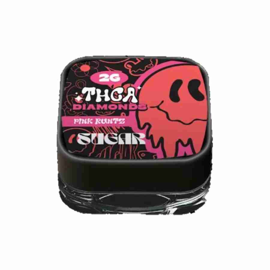 A tin with an image of a skull with a black background