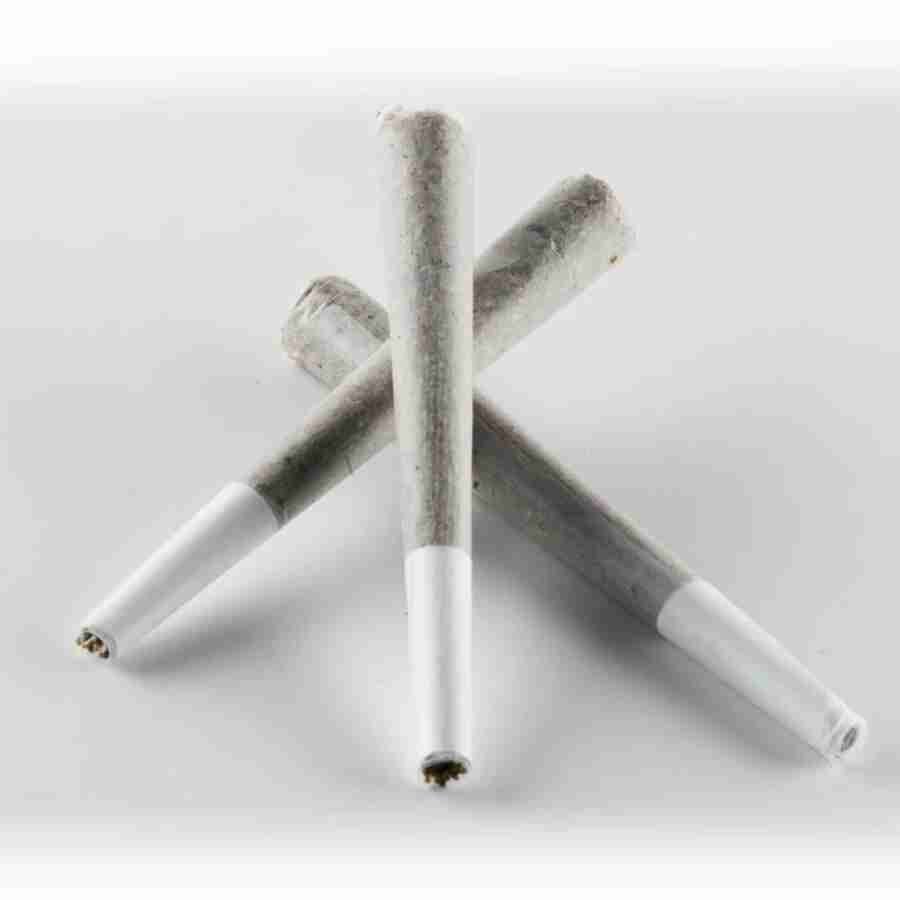 Three white and grey elyxr la thca infused joints g on a white surface